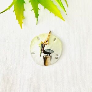 Pelican Sand Dollar Style Pendant